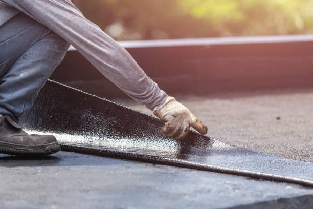 Professional Basement Waterproofing technician working in Fairfax, OH